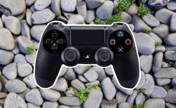 Titelbild PS4-Controller auf Steinen