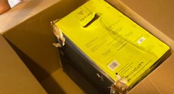 Titelbild nasser PC in Box