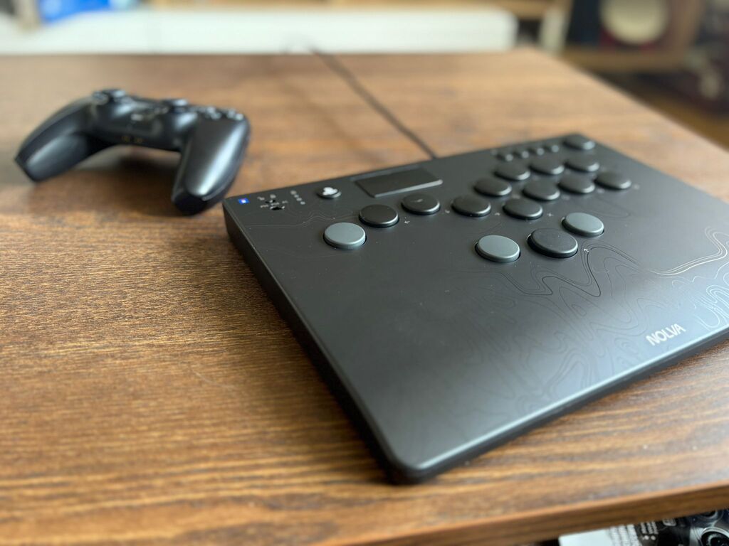 Nolva Mechanical All-Button Controller next to PS5 controller